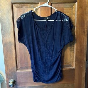Blue cap sleeve shirt with lace shoulders